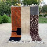 Handmade wool rug in colourful patterns, size 150x250 cm.