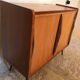 Vintage storage cabinet sliding doors feet compass