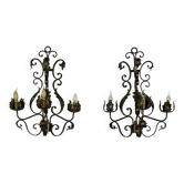 Appliques (la paire) en fer forgé à décor de feuillage