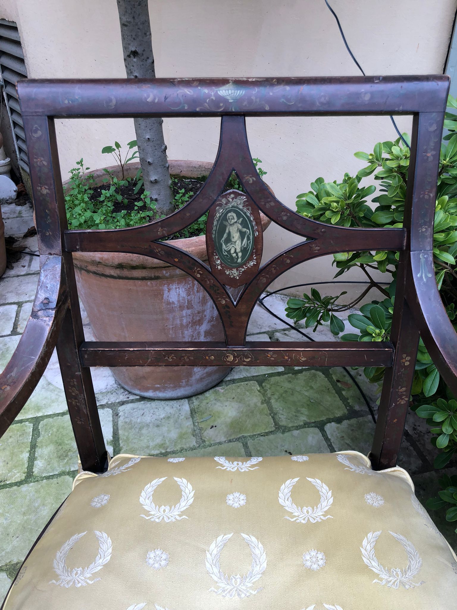 Pair of painted wooden armchairs, nineteenth century