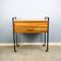 Wheeled sewing box, walnut with tubular steel legs, 1960s