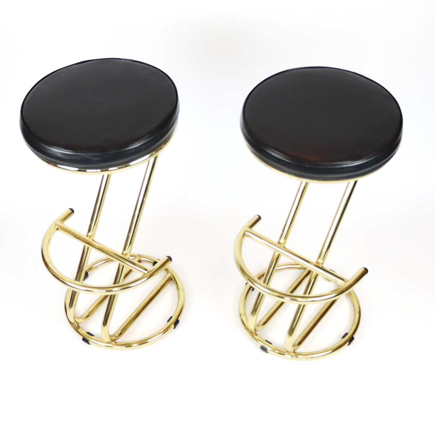 Pair of high brass stools