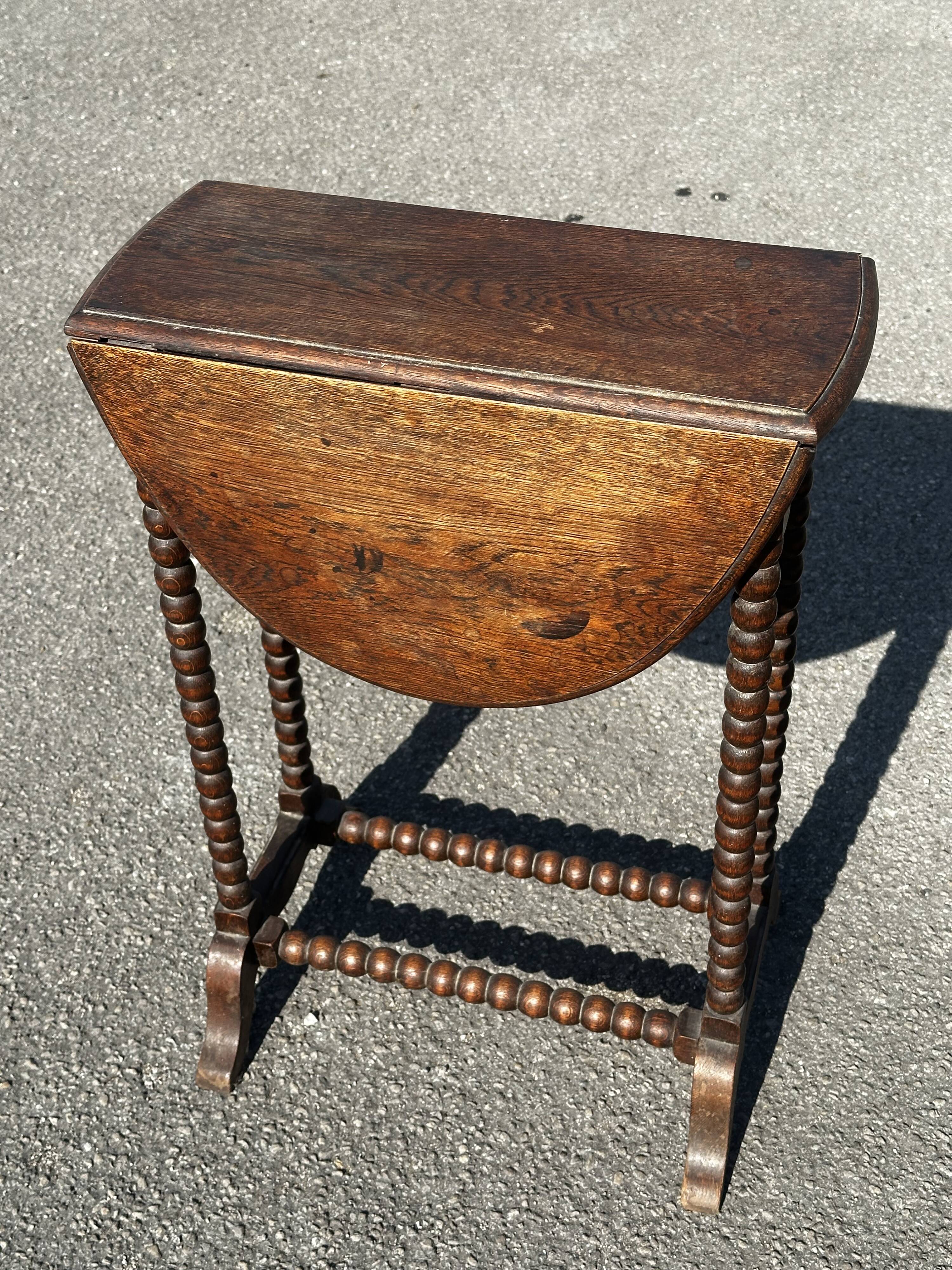 Small folding table called Gateleg, Victorian era