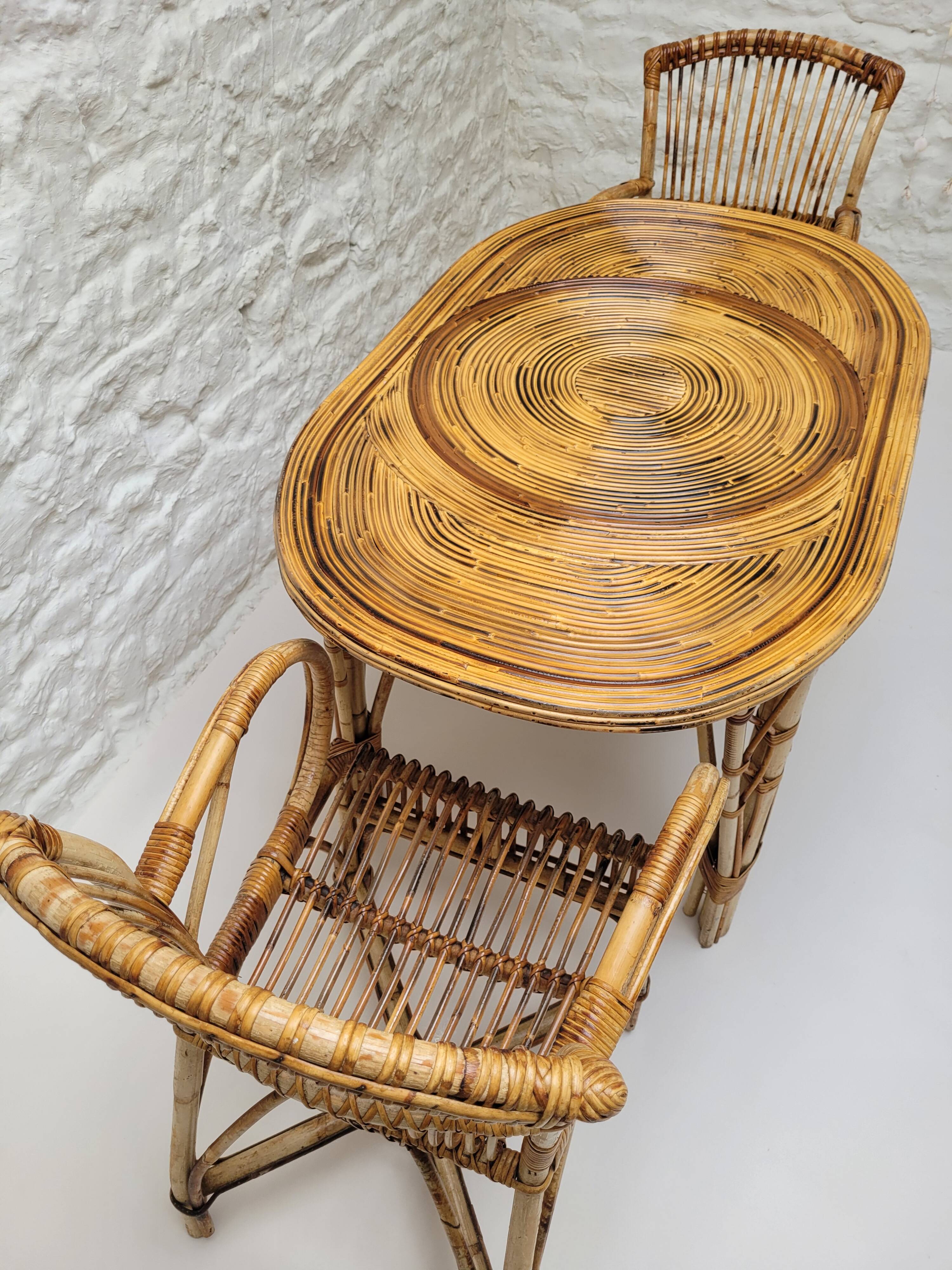 Vintage Audoux Minet bamboo, rattan, and smoked glass table duo.