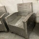 Pair of industrial metal armchairs