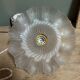 Suspension in transparent opaline