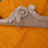 Carved wooden pediment