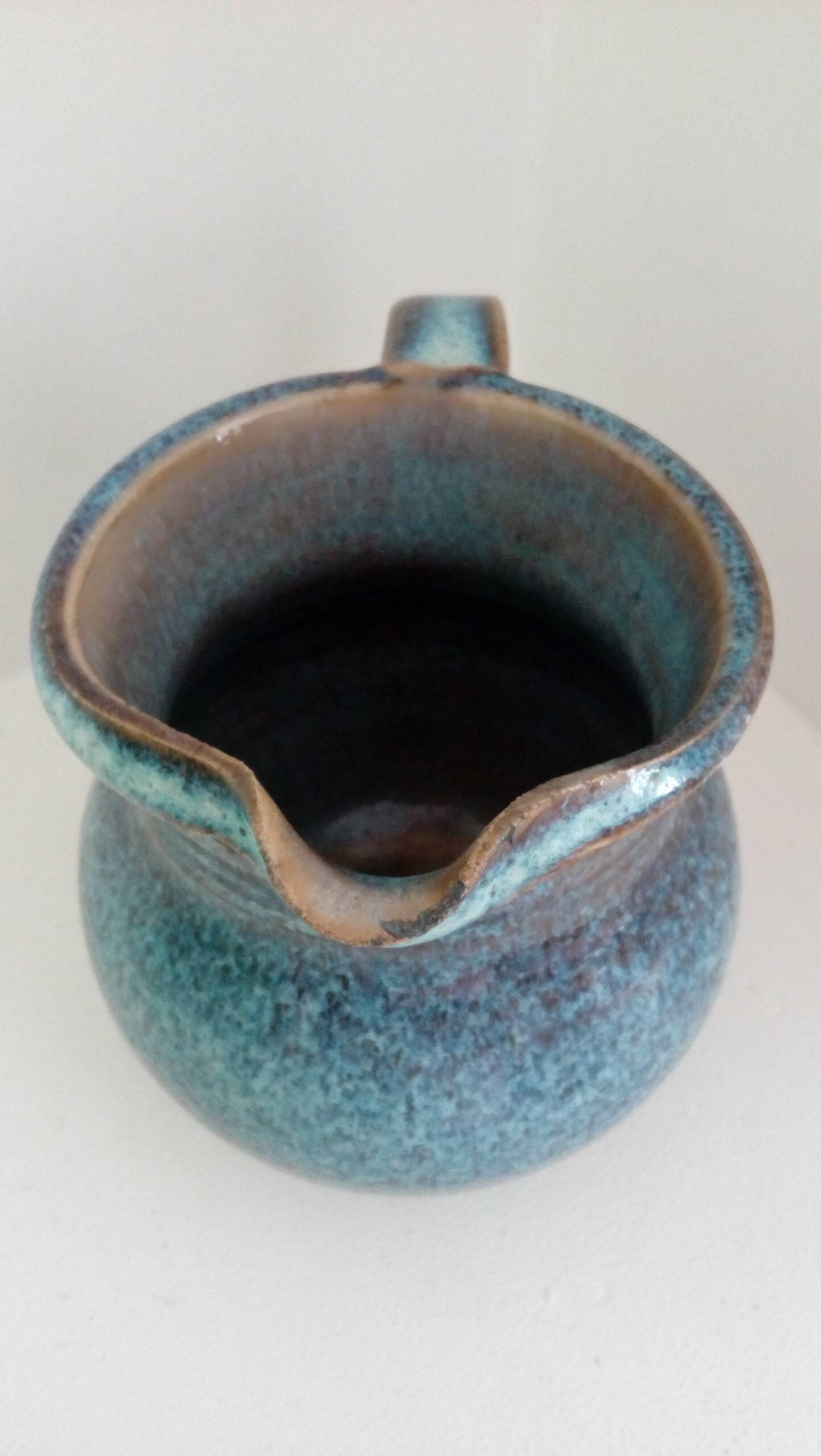 Pitcher in enamelled blue sandstone