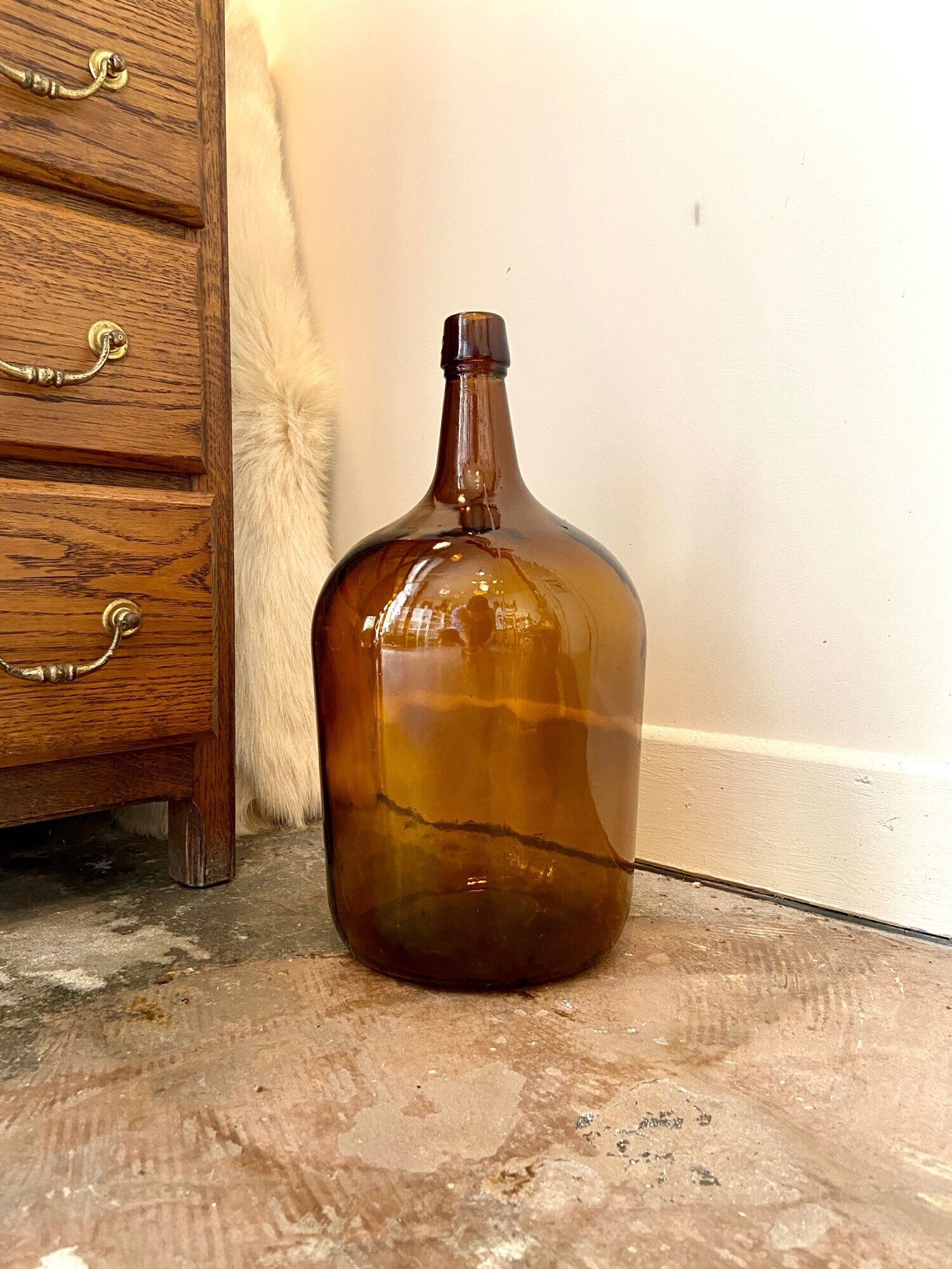 Bonbonne en verre ambré