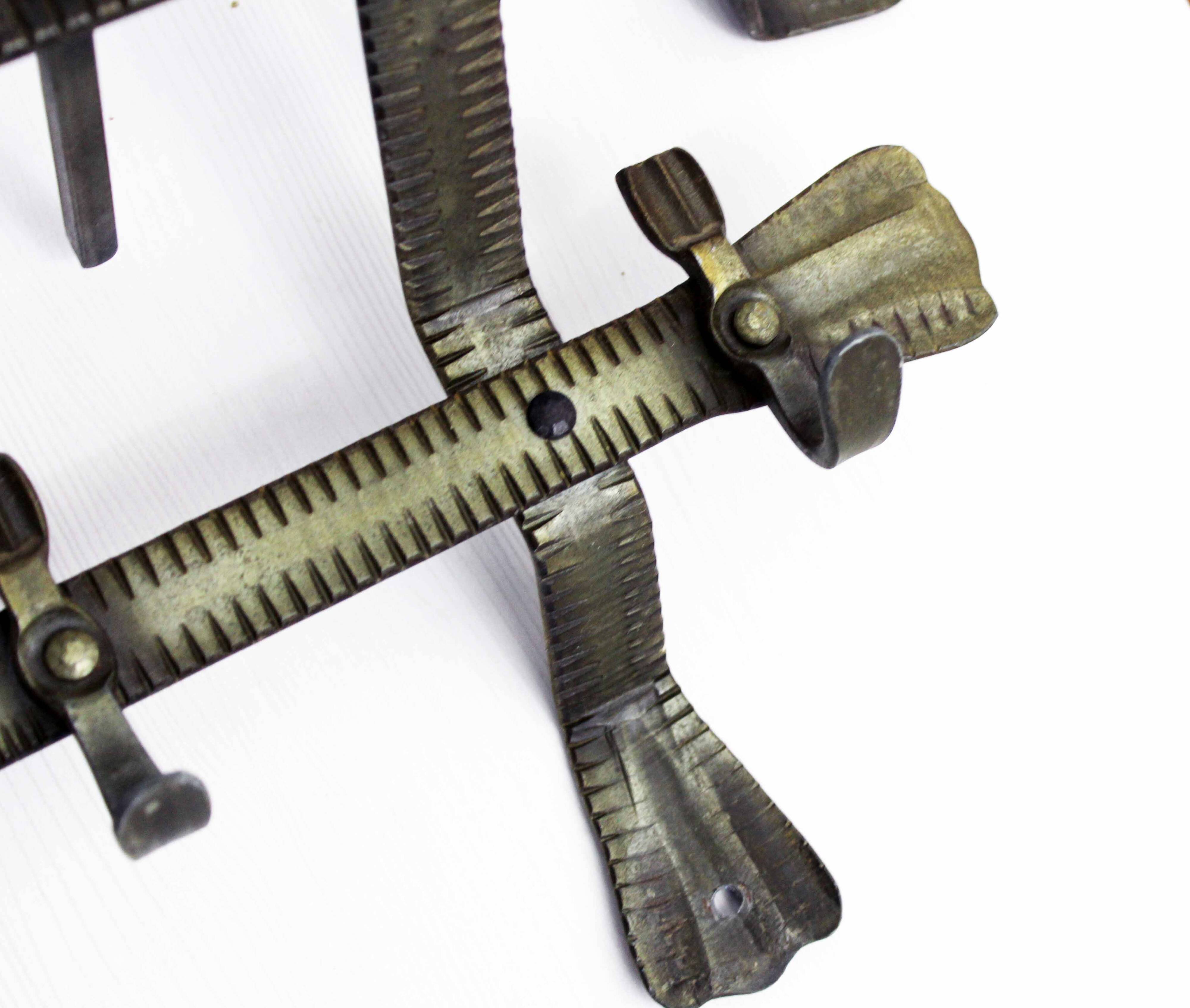 Metal wall coat rack