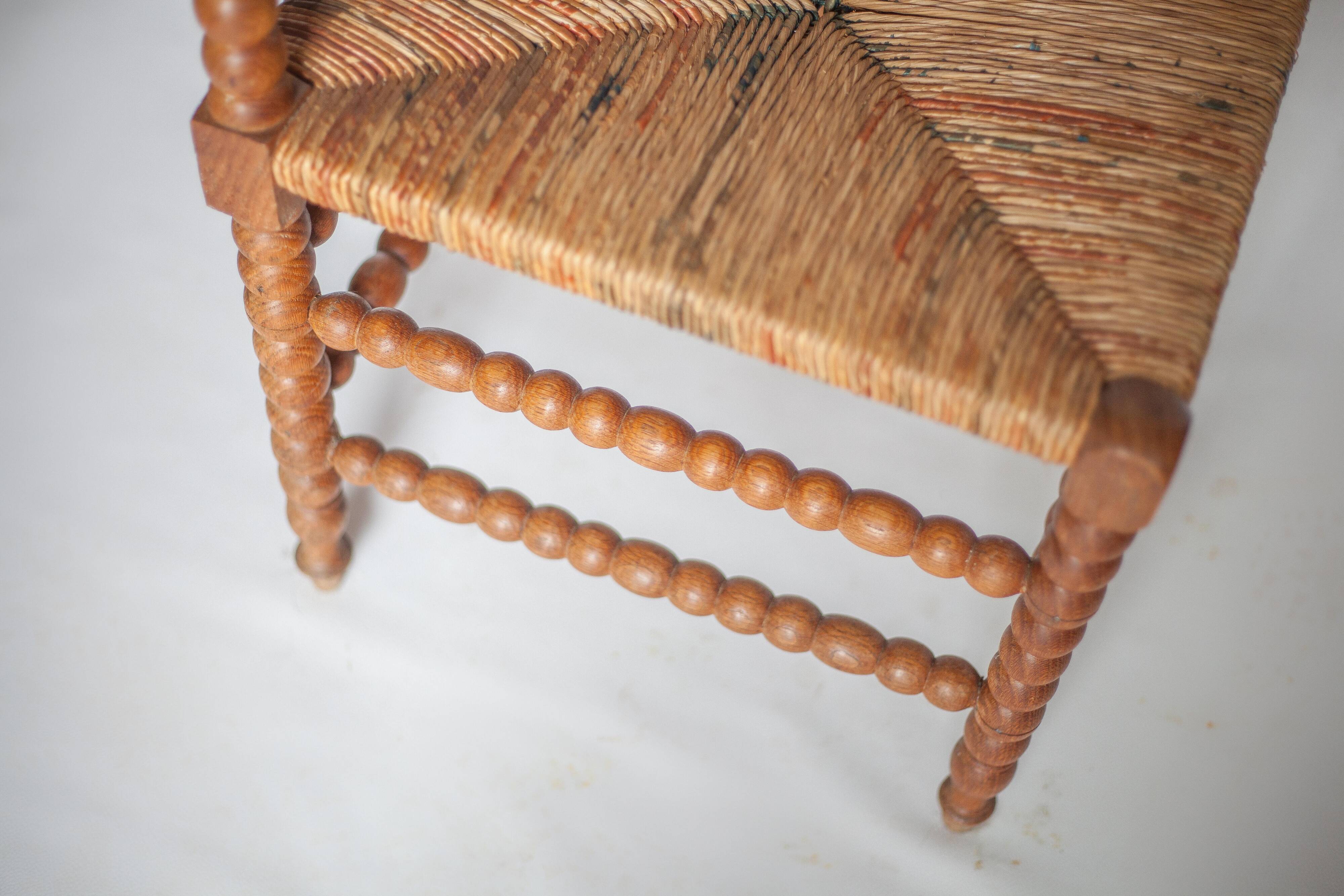 Wooden and caned corner chair, antique bobbin chair, occasional chair.