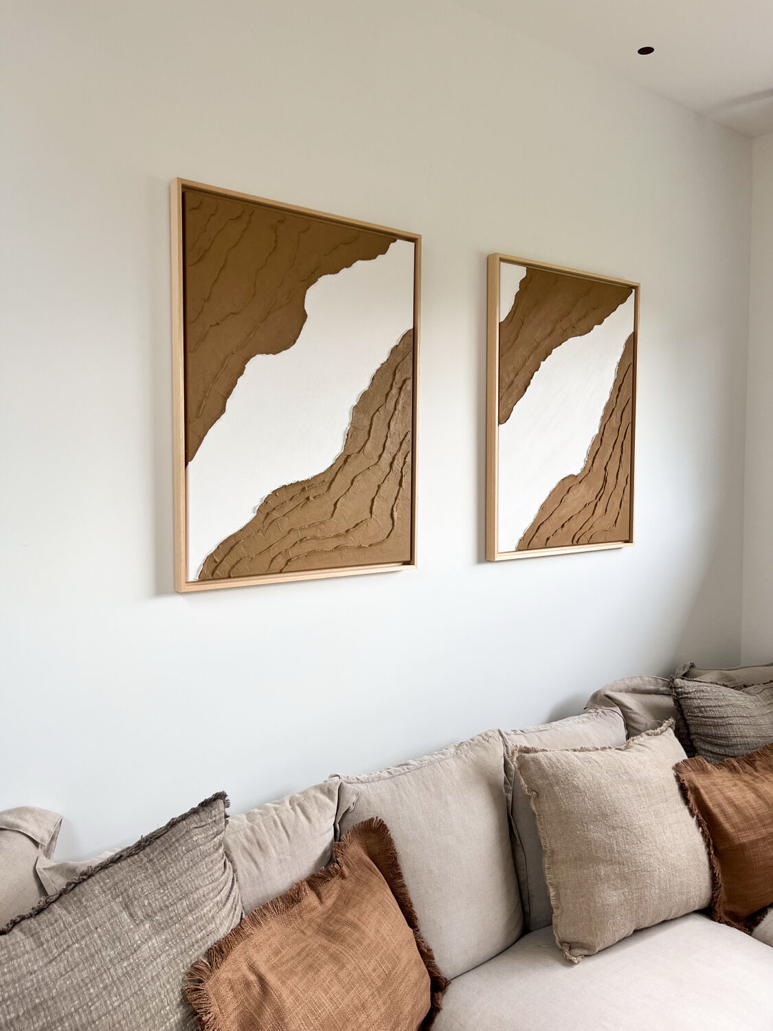 Brown and white relief diptych panels
