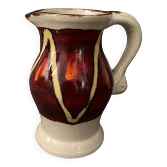Ceramic pitcher 1930 white and red background