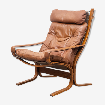 Scandinavian armchair, leather and wood
