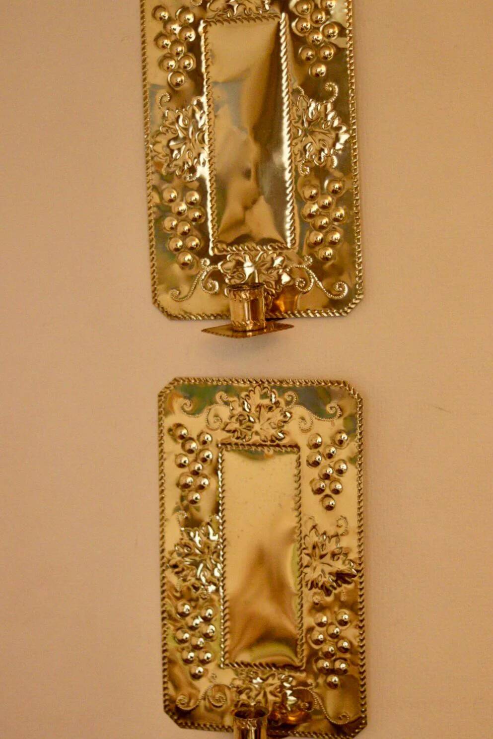A pair of Swedish brass wall sconces from the mid-century.