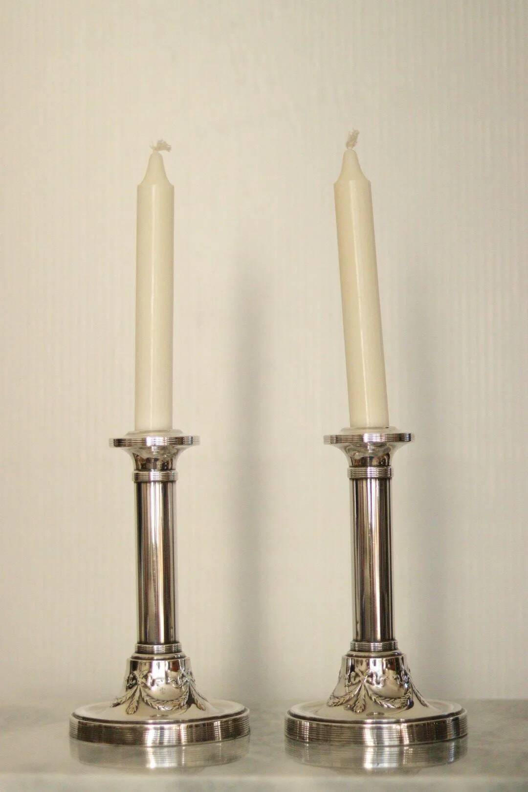 Pair of mid-century silver-plated metal candleholders