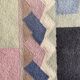 Tapis en laine noué main Tisca à motif géométrique, signé “ILES”, France, années 1990