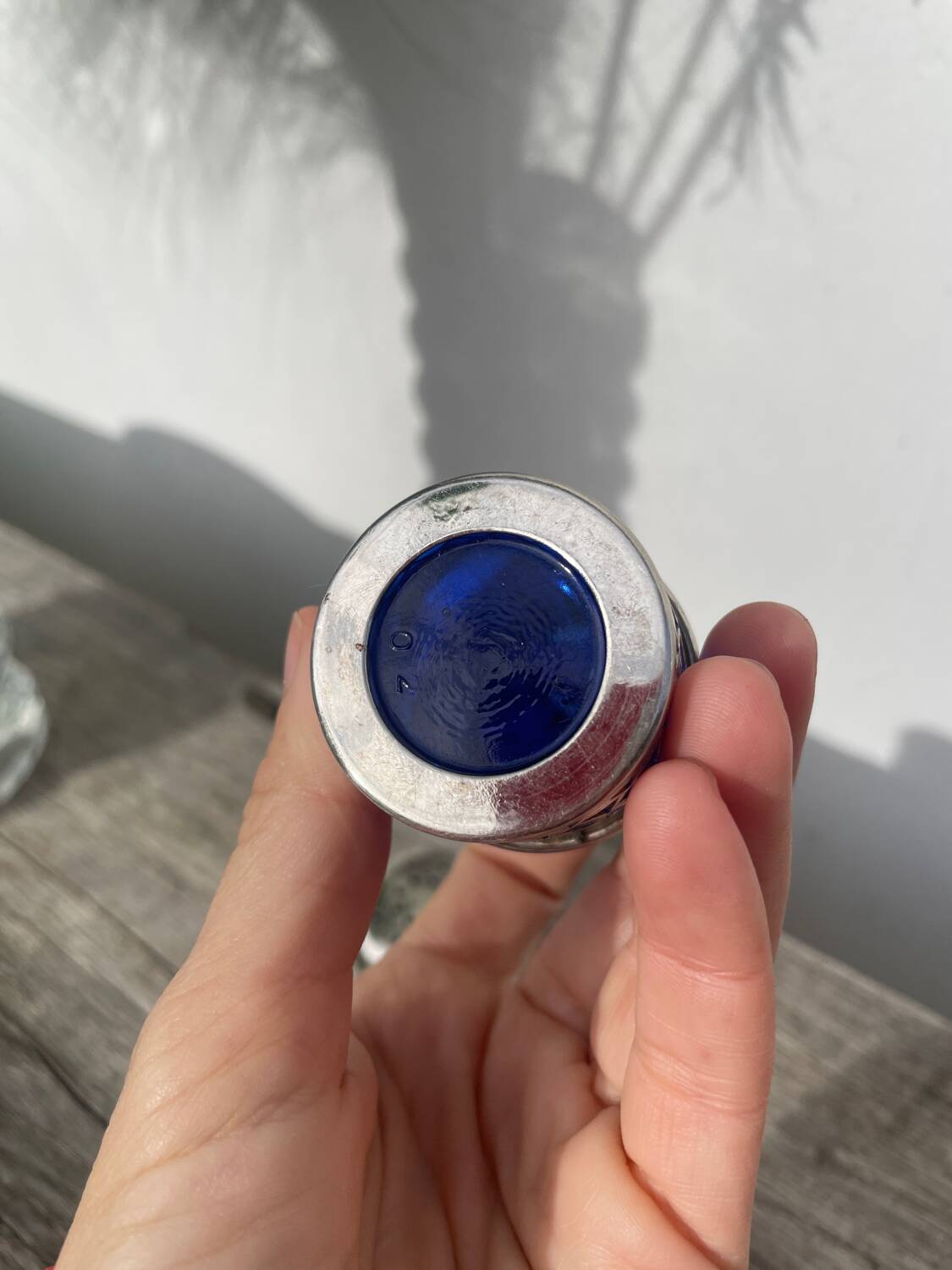 Silver-plated metal and blue glass salt and pepper shaker