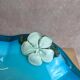 Large vintage blown glass bowl in turquoise – Murano style – applied flower