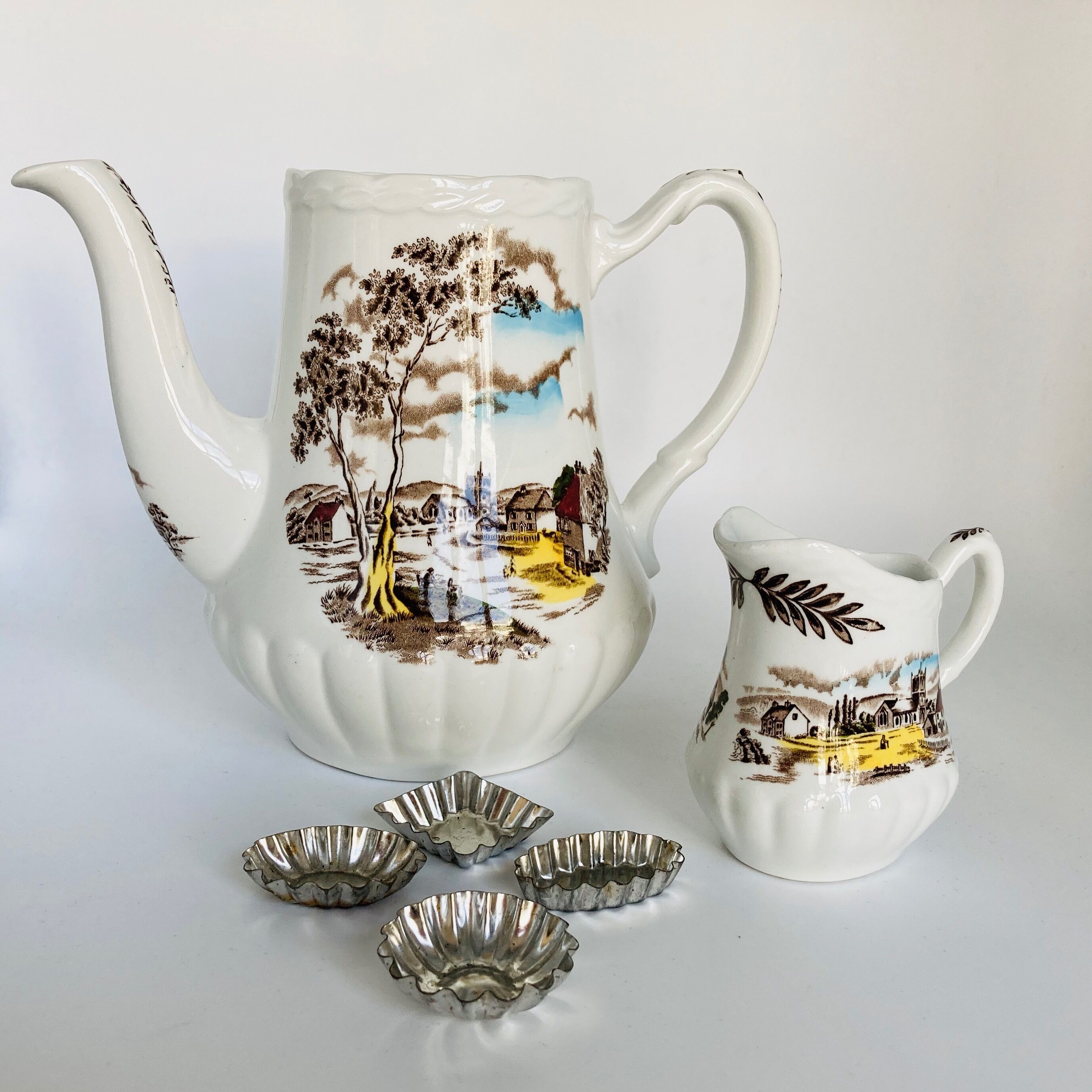 English earthenware cafeteria and its milk pot