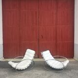 Pair of vintage chrome and leather rocking chairs