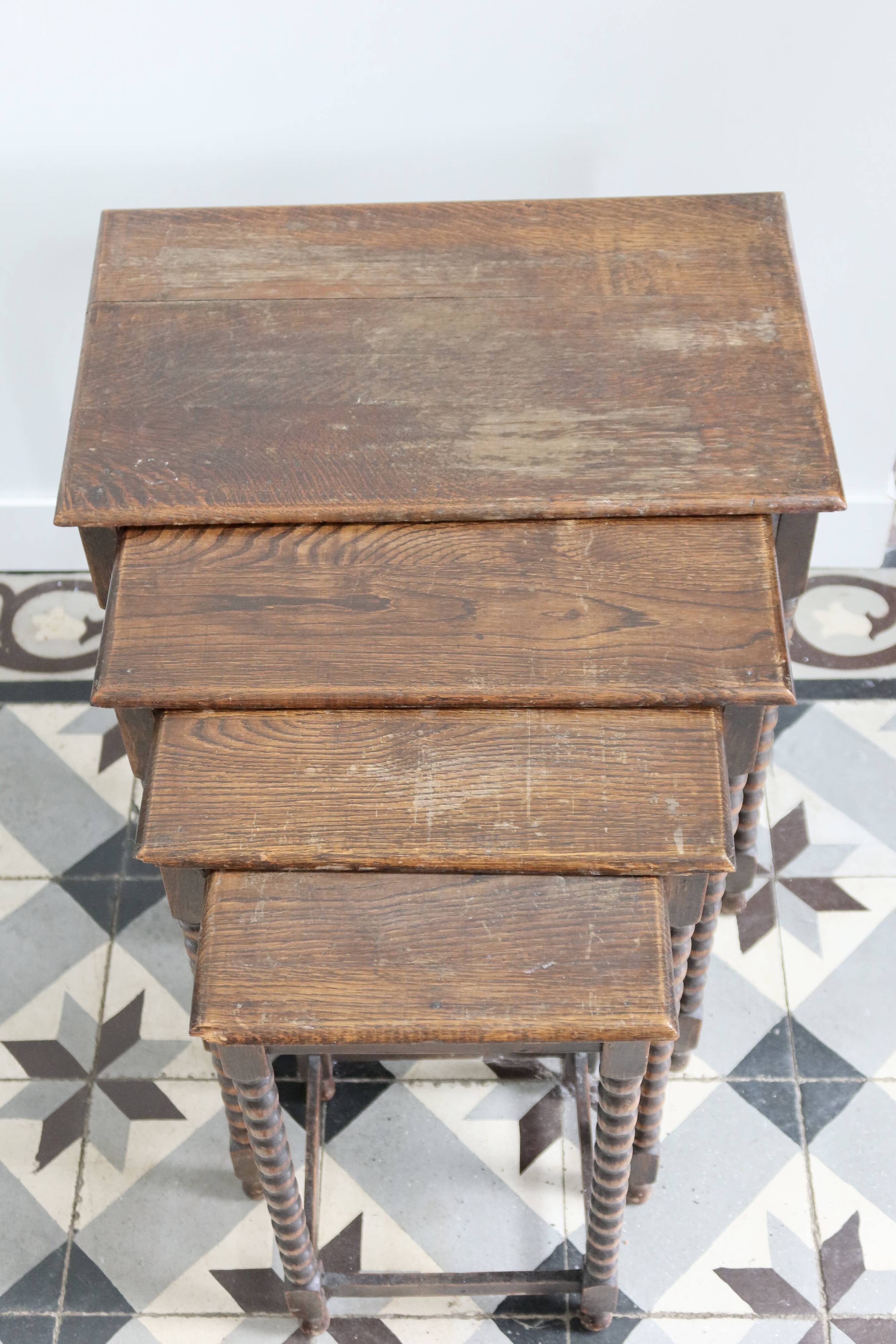 4 antique nesting tables made of turned wood