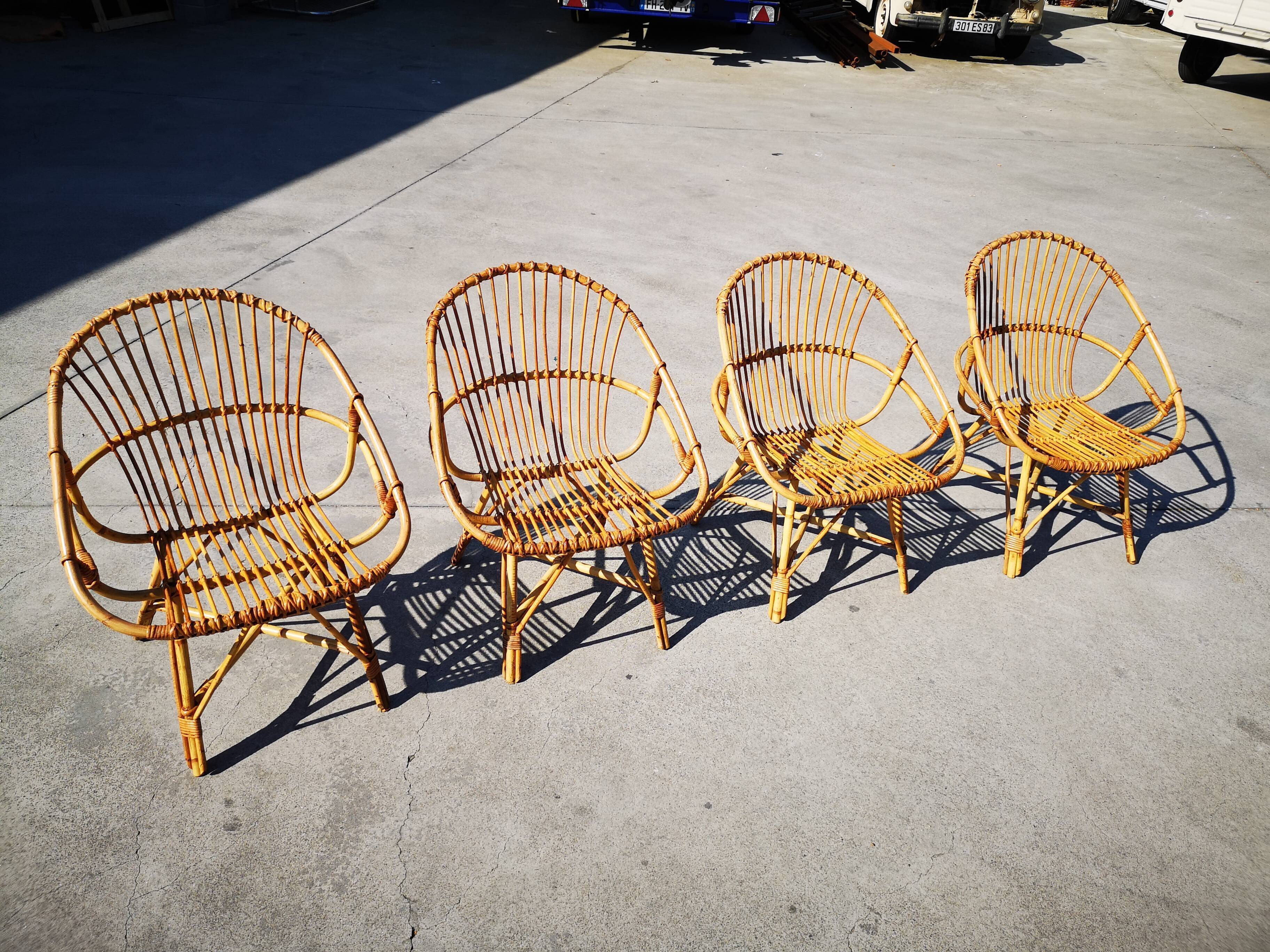 Four rattan chairs