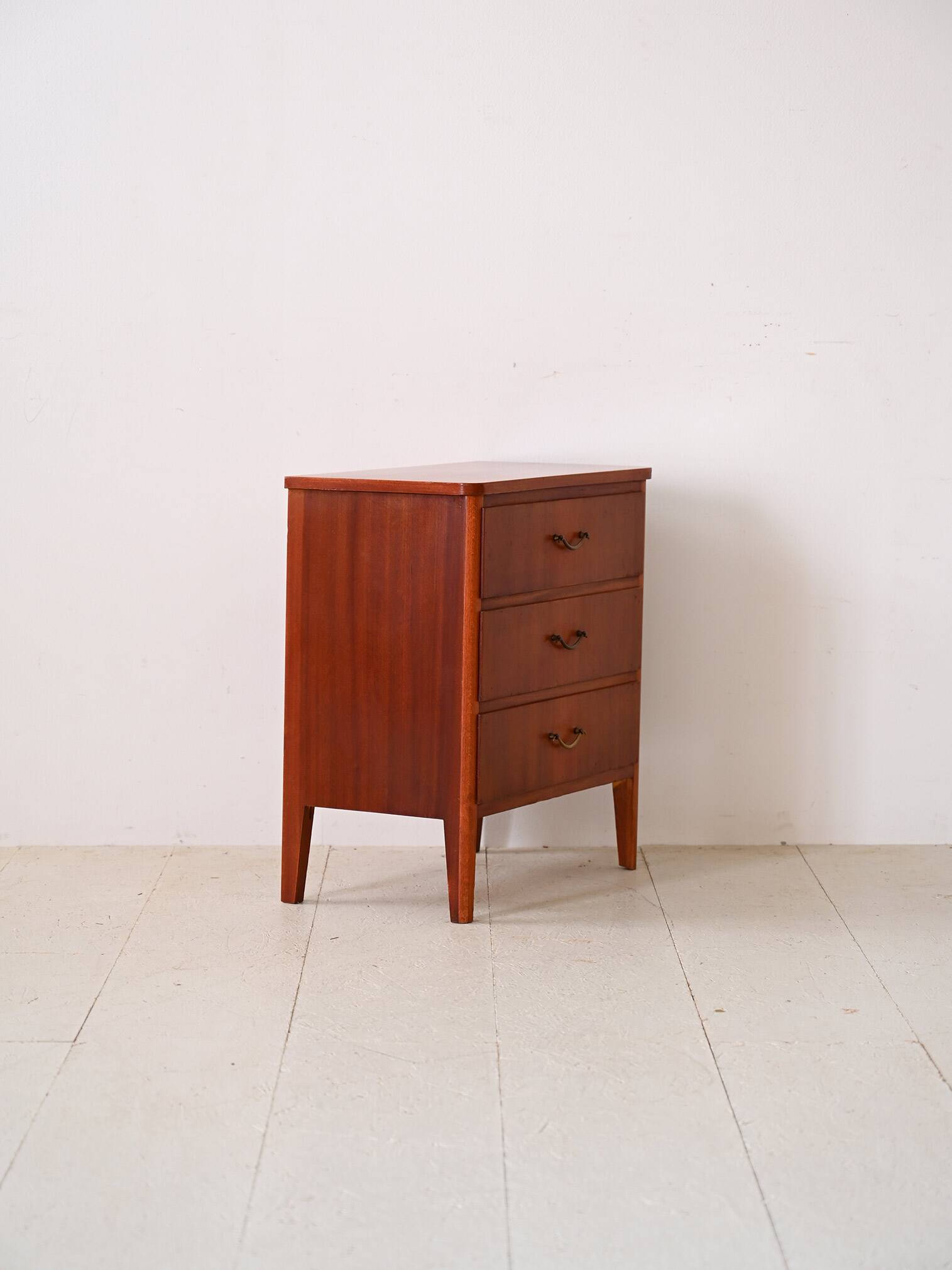Mahogany chest of drawers with metal handles