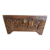 Carved chest in Asian camphor wood, chinoiserie boat decoration.