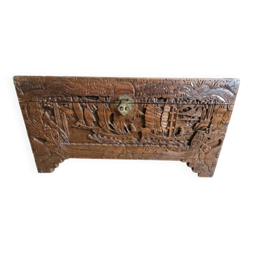 Carved chest in Asian camphor wood, chinoiserie boat decoration.