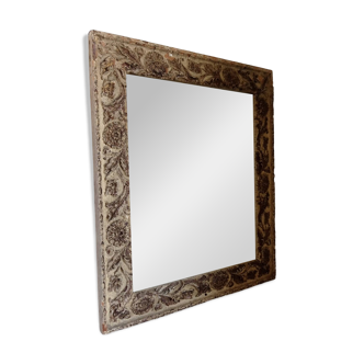 Wood and patinated stucco mirror