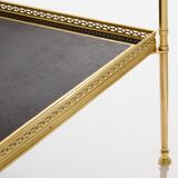 Pair of neoclassical side tables in brass and black leather by Maison Jansen, 1960.