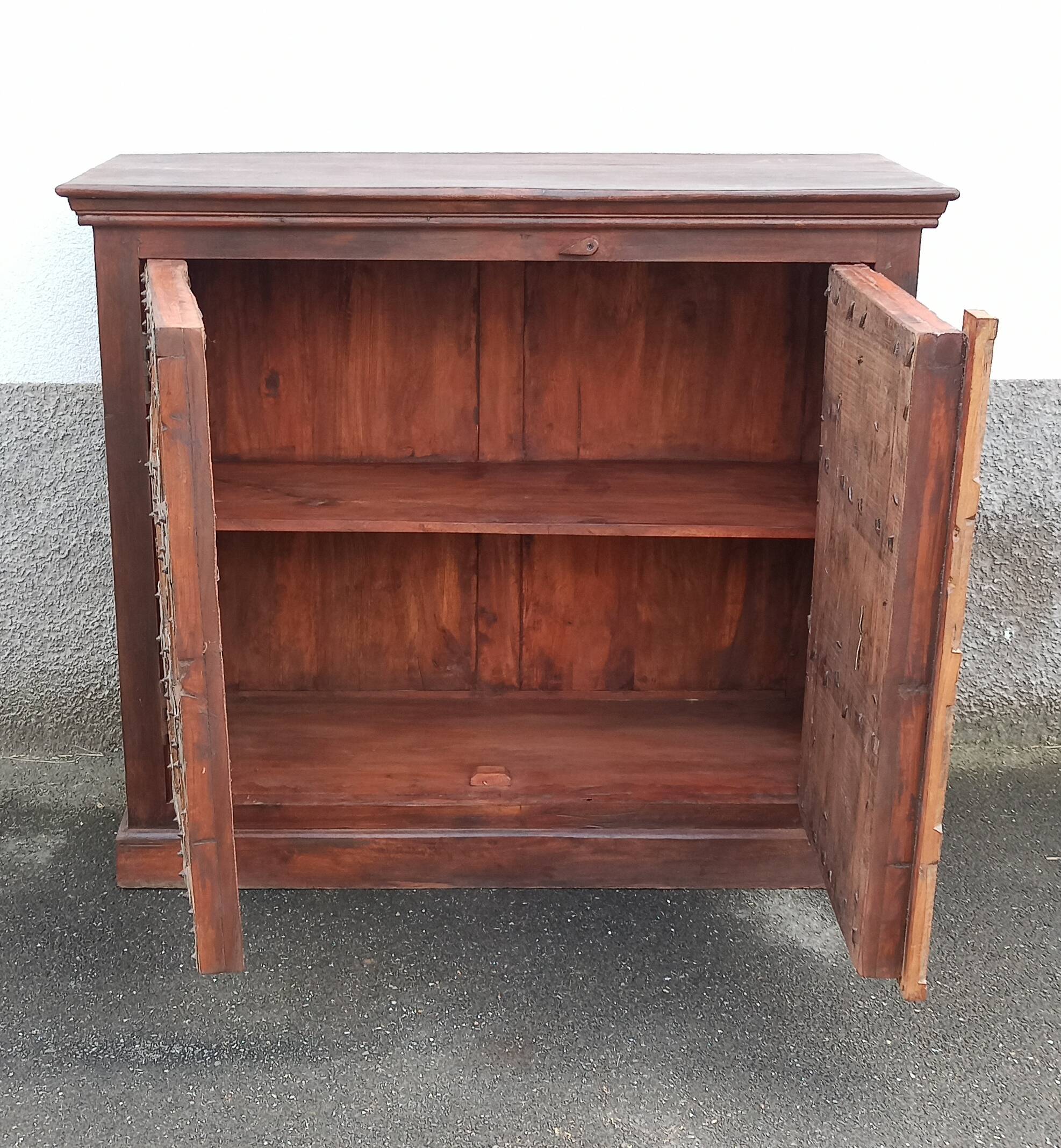 Small old wooden sideboard with two doors