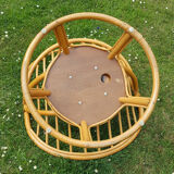Fauteuil en rotin pivotant