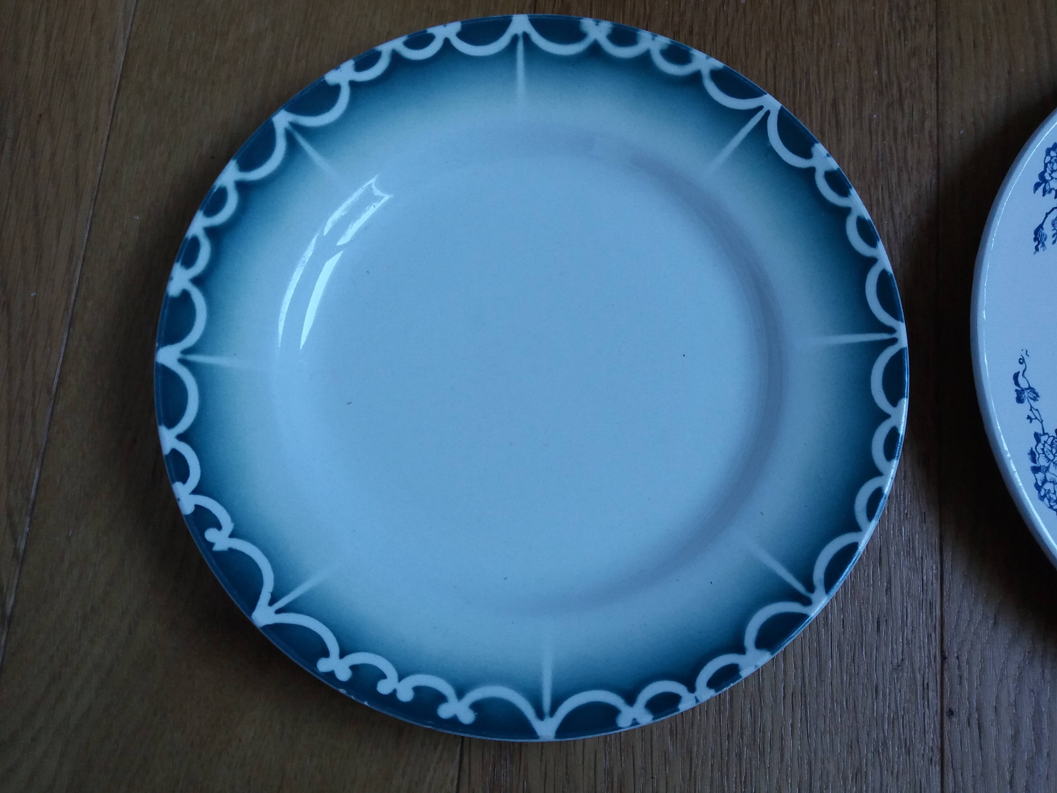 Old green and blue mismatched plates from Digoin, Salins, Moulin des Loups