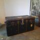 Old and large travel trunk, brass-plated corners