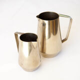 Duo of bronze pitchers
