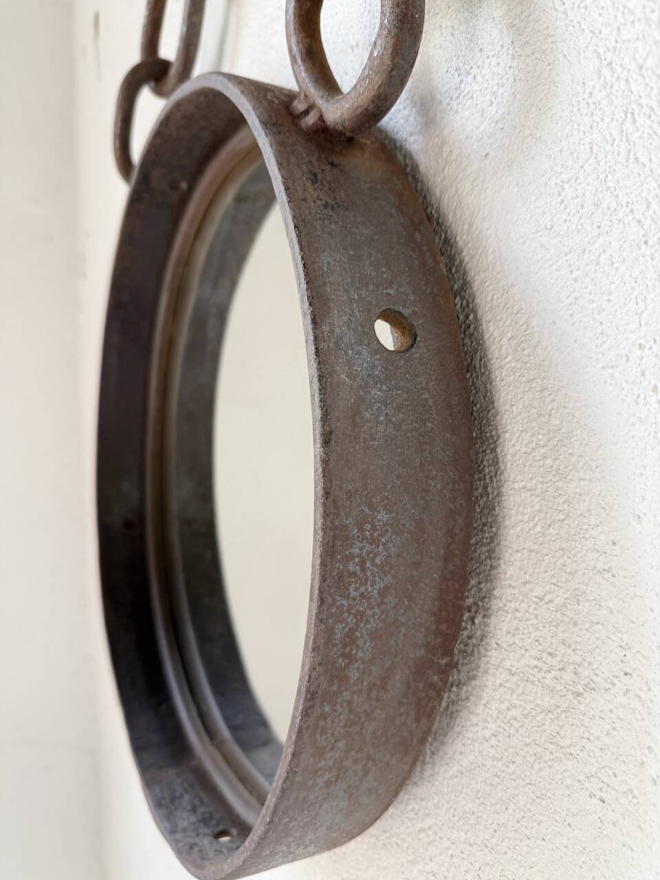 Brutalist mirror with metal chain from the 50s