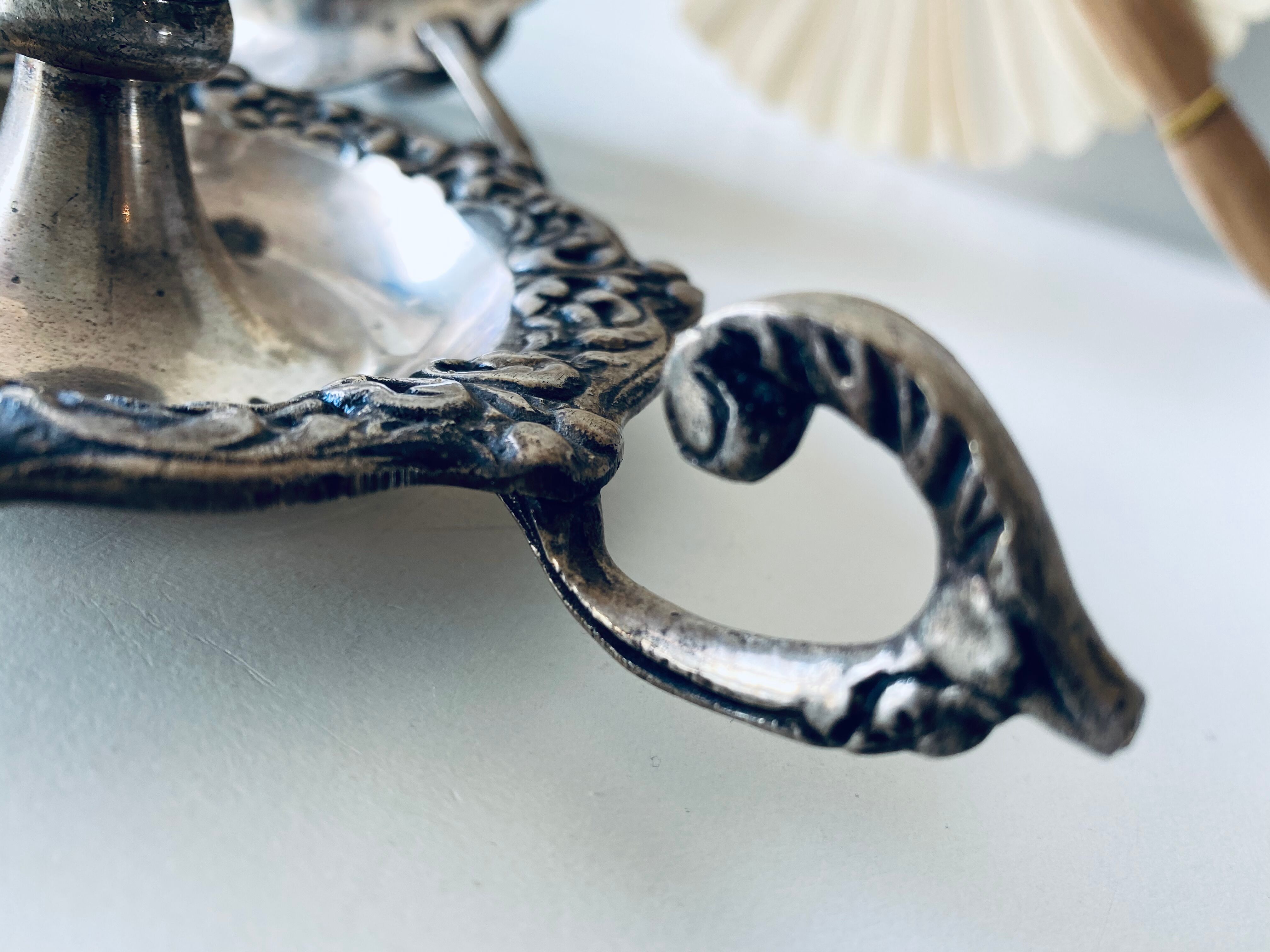 Pair of silver metal candlesticks