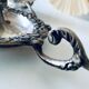 Pair of silver metal candlesticks