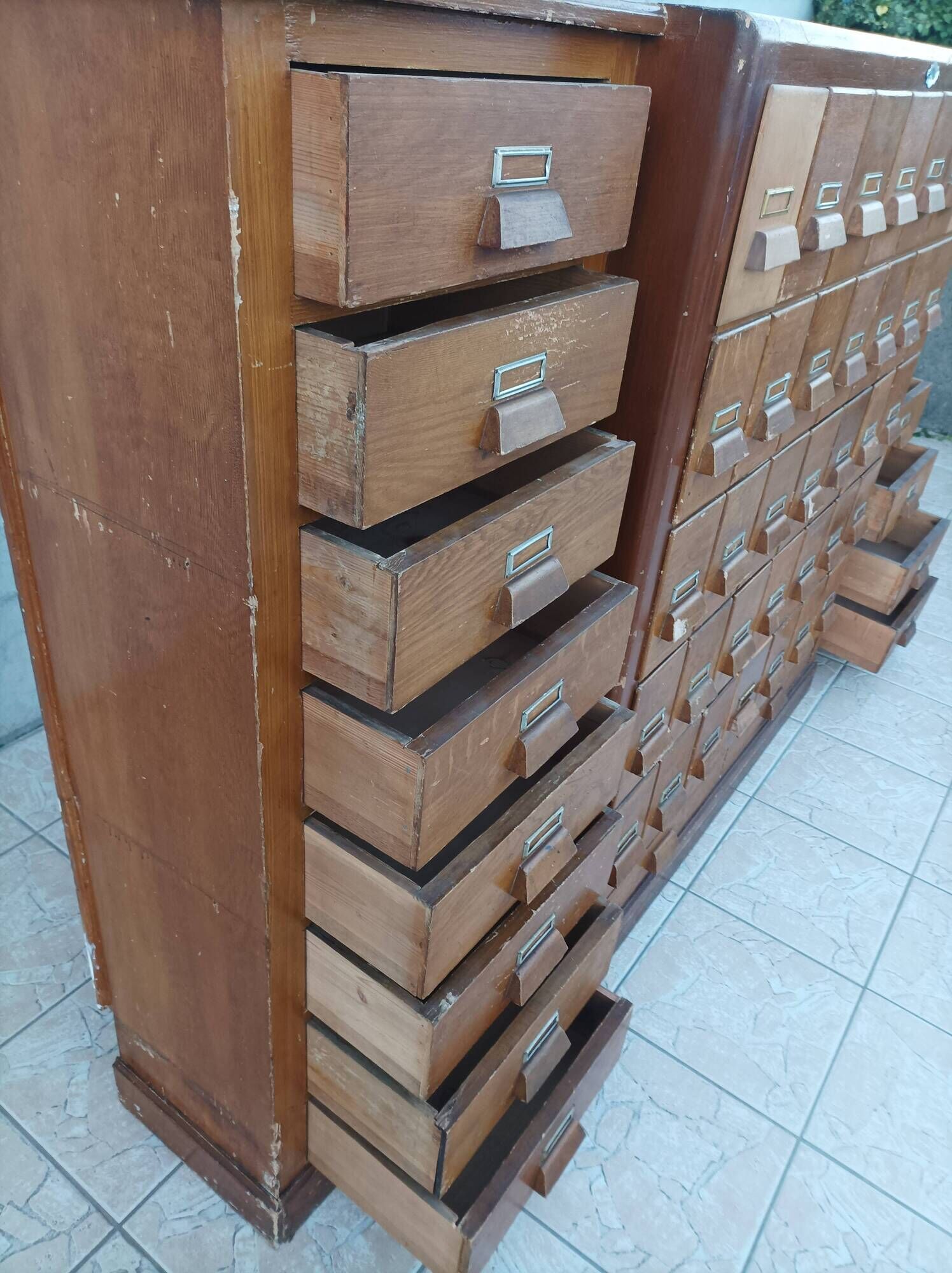 Apothecary or trade cabinet in fir with 53 drawers.