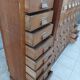 Apothecary or trade cabinet in fir with 53 drawers.