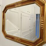 Mirror in wood and gilded stucco