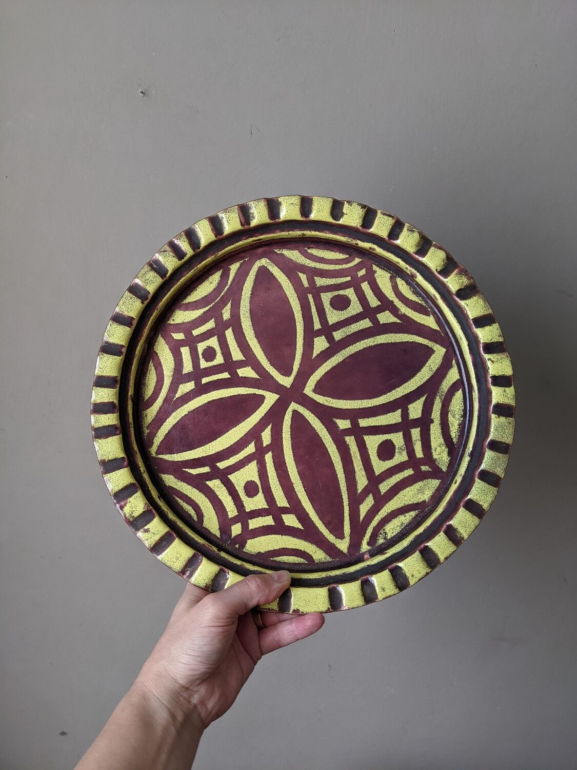 Extra-large enameled copper tray or catchall with ethnic tribal decoration.