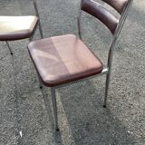 Pair of retro metal and leather chairs