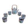 Enamelled sandstone tea service decorated with blue flowers, teapot and six cups