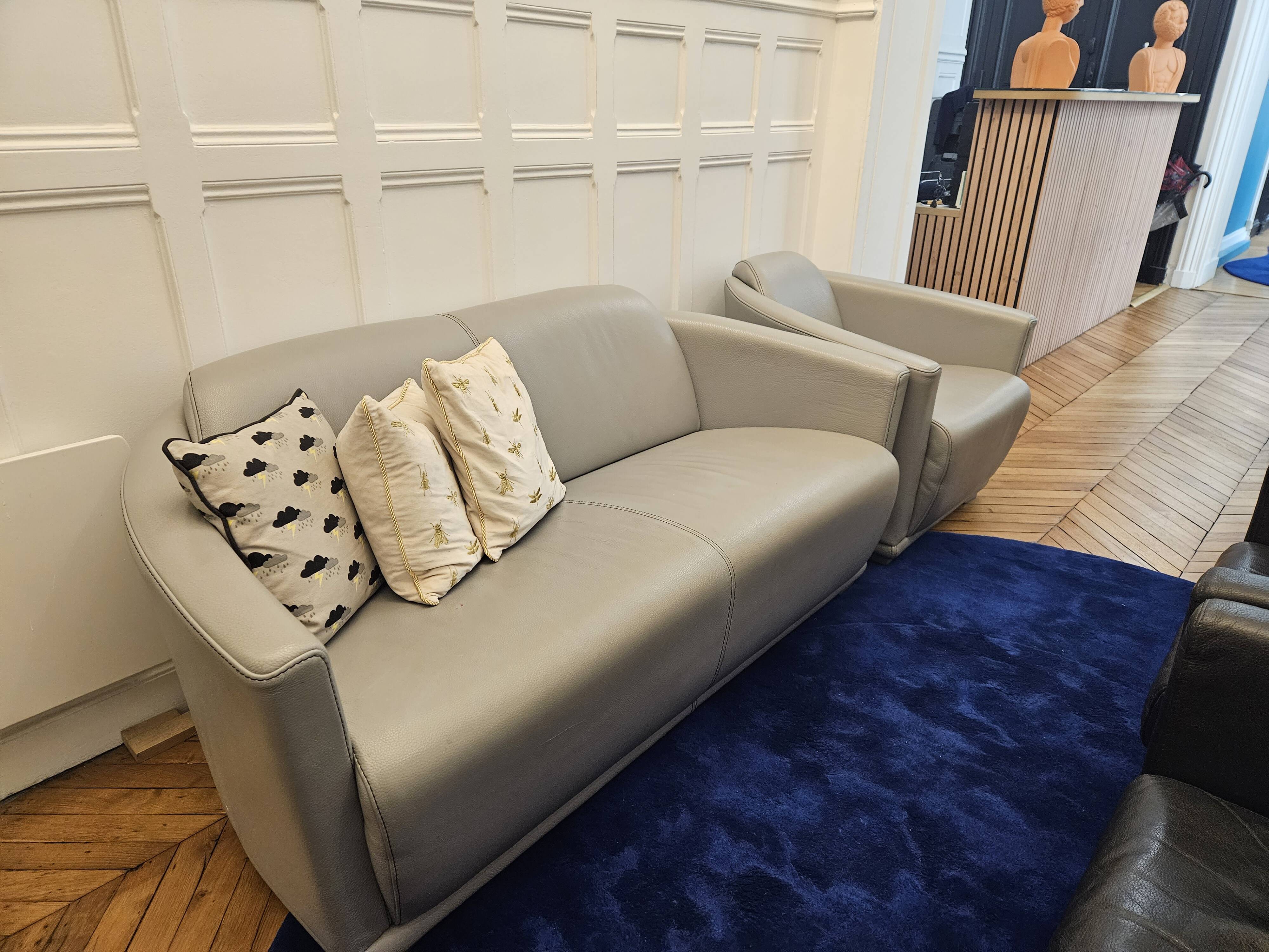 3-seater sofa, 2-seater sofa and an armchair in grey leather by Calia Italia.