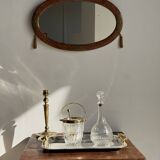 Small oval Art Deco mirror in brown and gold 33x54.