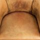 Vintage sheepskin club armchair in a light cognac colour