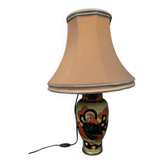 20th century Japanese ceramic lamp with rich decoration on a yellow background with red stamp